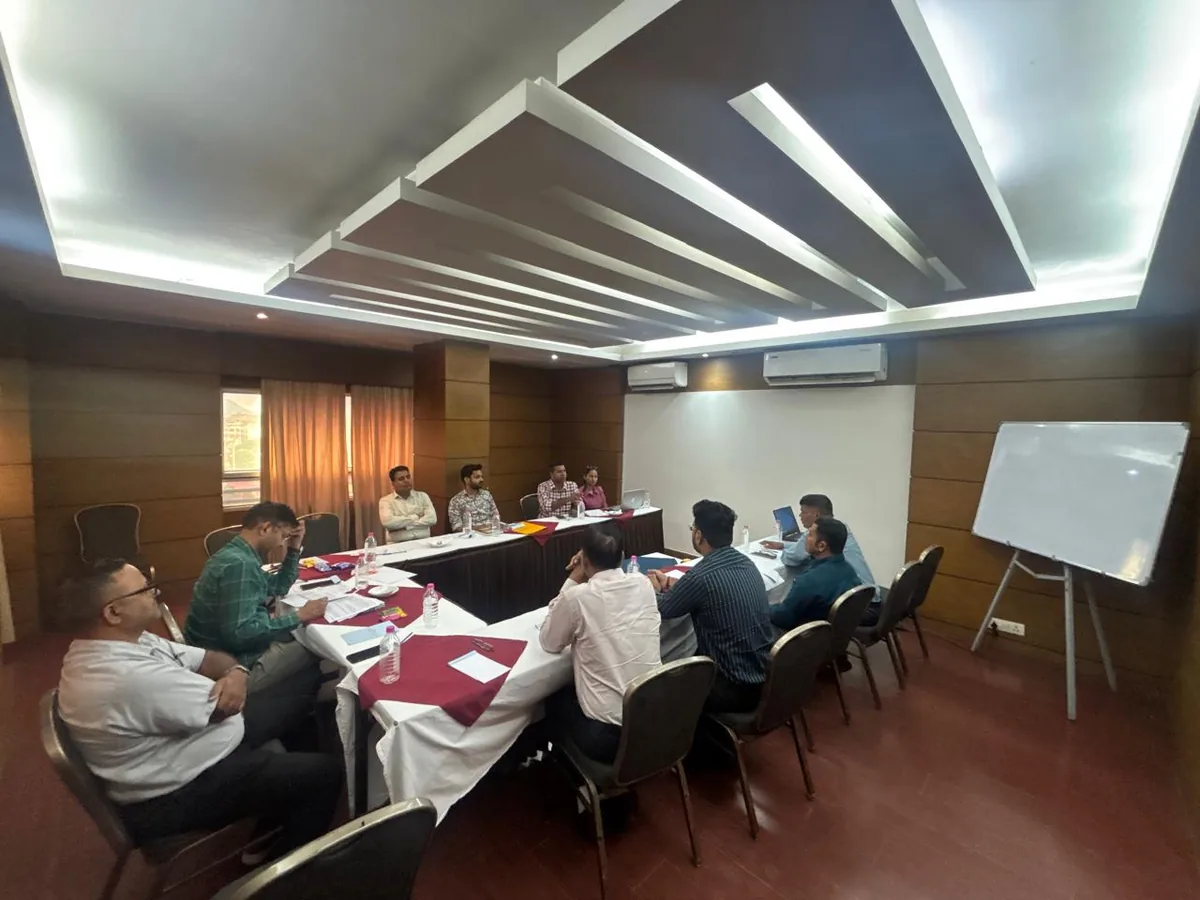Wasro team and partners discussing plans around the conference table